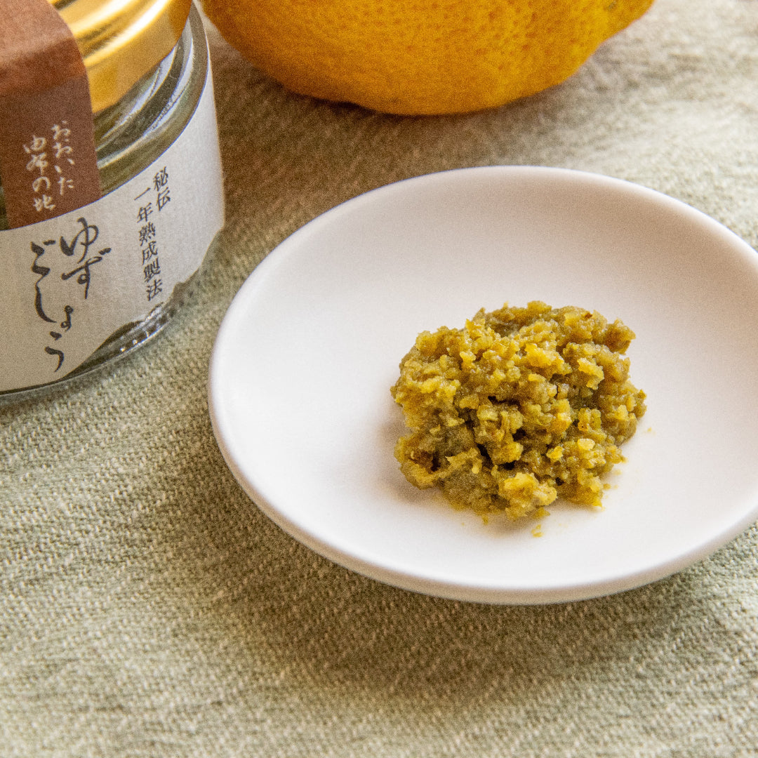 A tangy and fiery paste made from yuzu and green chili peppers